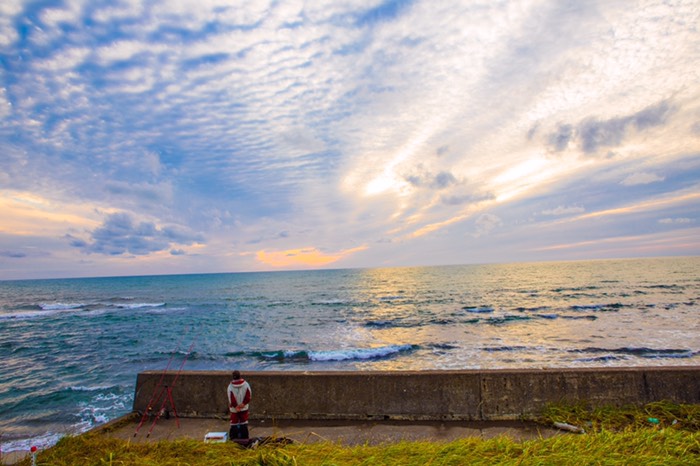 夕日と釣りのおじちゃん