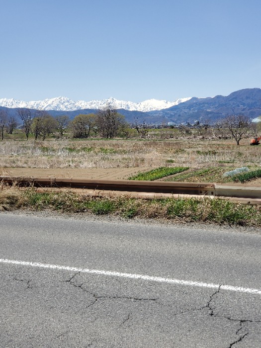 千曲川から望む北アルプス